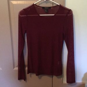 See-through long sleeve maroon shirt.